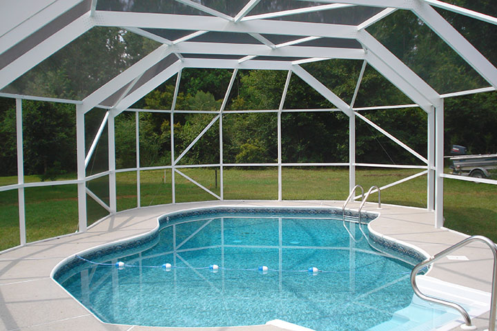 Beautiful pool enclosure with geometrucal shapes that accentuate the swimming pool environment