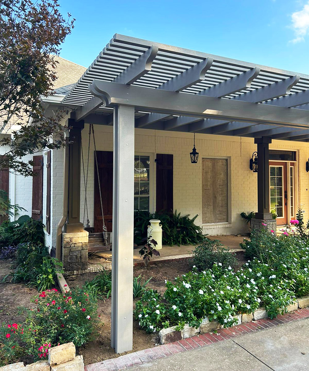 Aluminum pergola structure showing columns, beams, and open roof members
